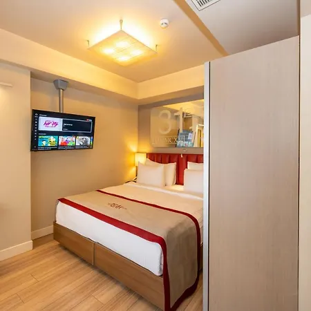 Ramada By Wyndham Istanbul Pera Taksim Hotel Exterior photo A room at the hotel