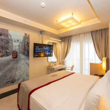 Ramada By Wyndham Istanbul Pera Taksim Hotel Exterior photo A room at the hotel